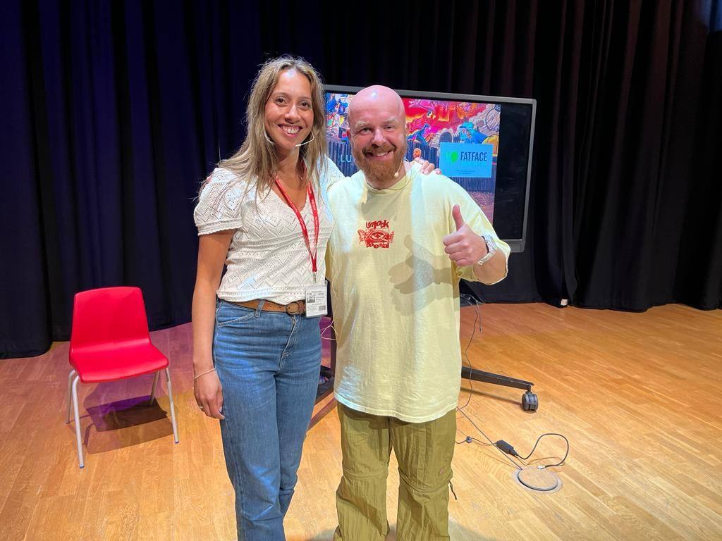 On a school stage, after the session.