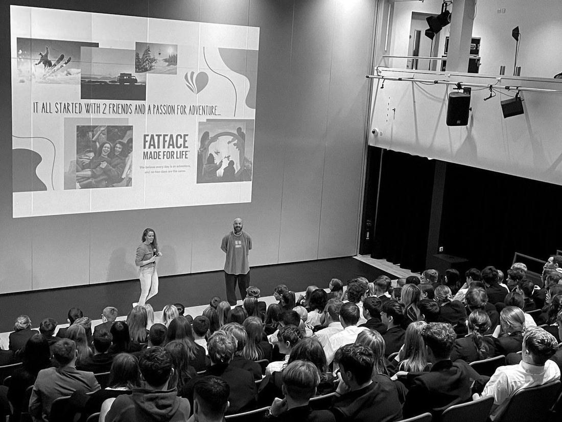 A full school hall at an Inspiring The Next Generation session funded by the FatFace Foundation.